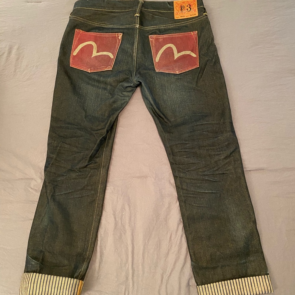 Evisu jeans with red back pocket
